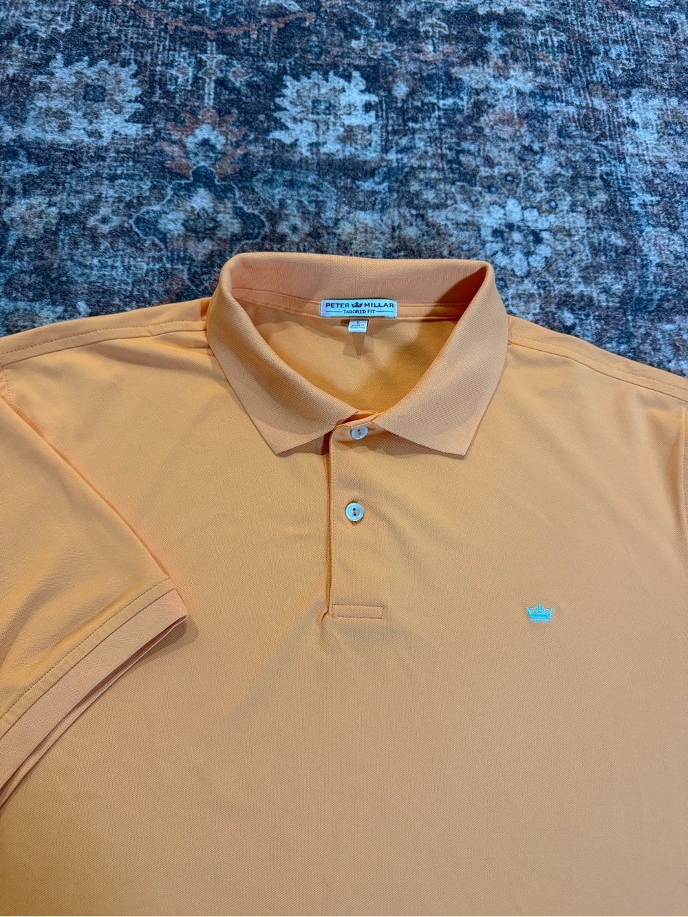 Peter Millar tailor fit orange polo shirt Size L with crown logo on chest